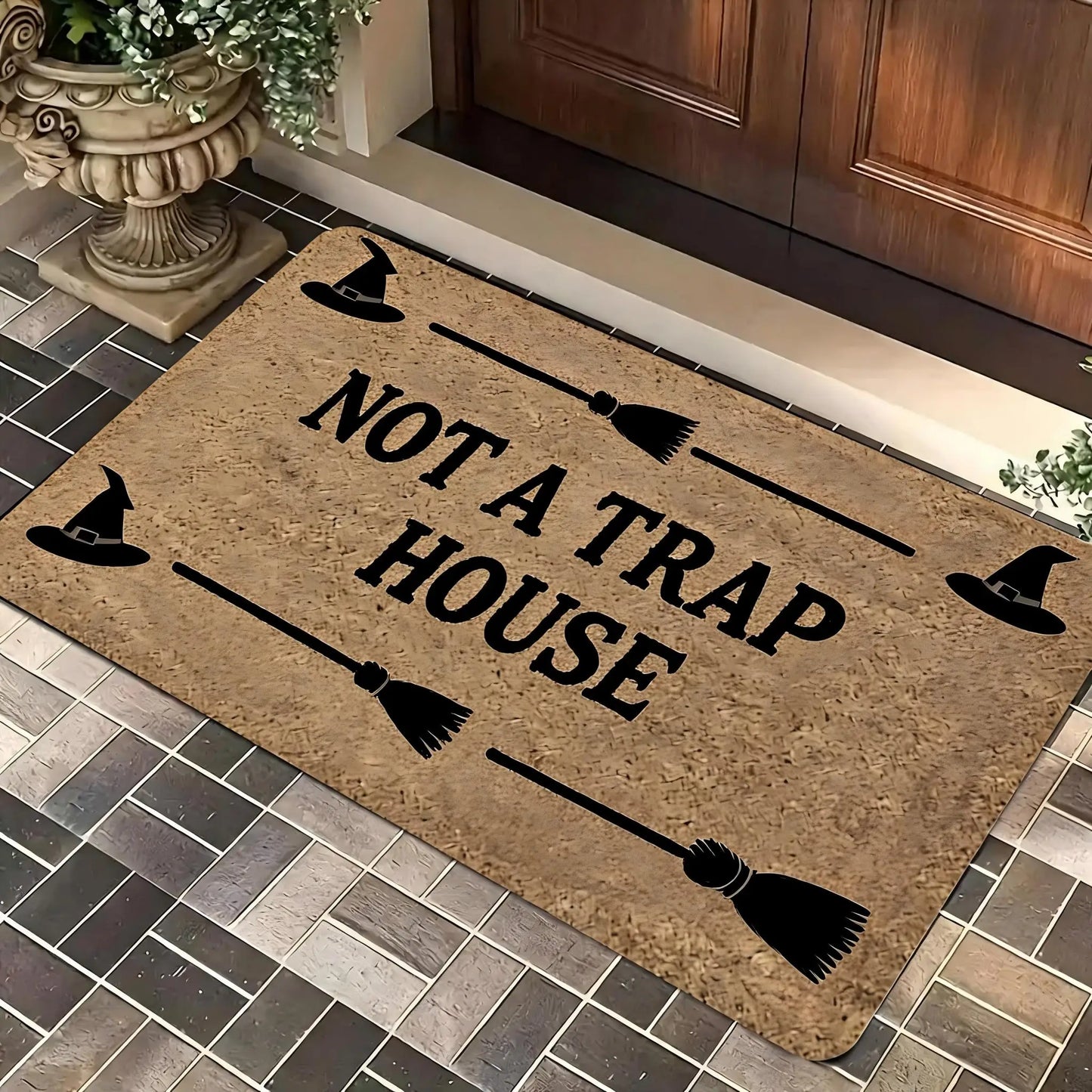 A Magical Doormat Featuring 'THE WITCH IS IN', Made of Plush Material with a Thickness of 0.4 Inches And Weighing 1.28 LB. It Has a Brown Base with a Black Star And Spell Design, for Halloween